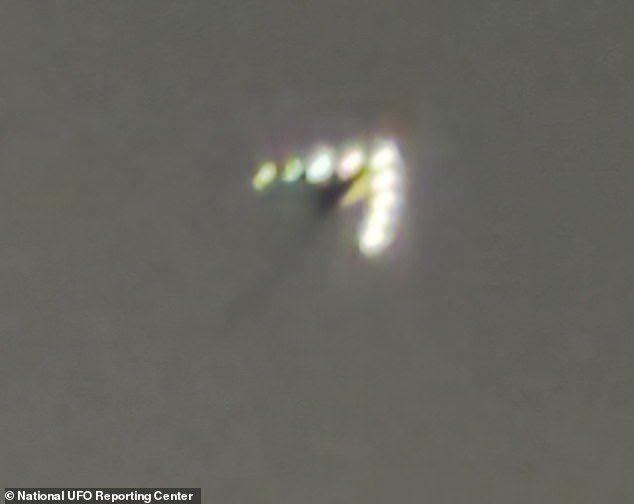 The UFO was seen having a V shape with nine lights along its body