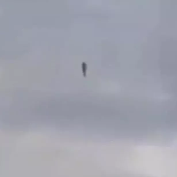 Bizarre-humanoid-figure-spotted-floating-in-the-sky-in-strange-footage.jpg