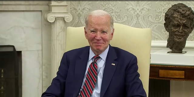 President Biden smiles