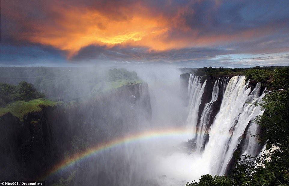 12348158-6927815-Victoria_Falls_is_a_355ft_high_waterfall_on_the_Zambezi_River_on-a-51_1555925663031.jpg