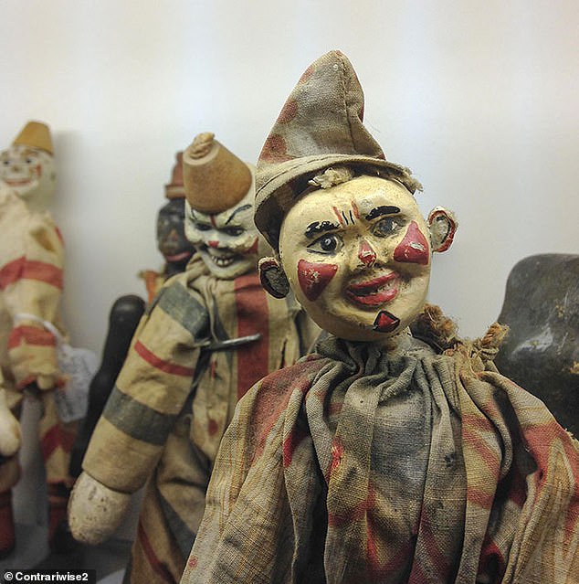 55756135-10648471-This_terrifying_old_puppet_doll_was_probably_loved_in_its_day_bu-a-15_1648229558741.jpg