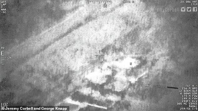 Military coordinates on the bottom right of the images give the location of the Reaper Drone video as North Eastern Iraq, near Baghdad. The cylindrical object is seen right
