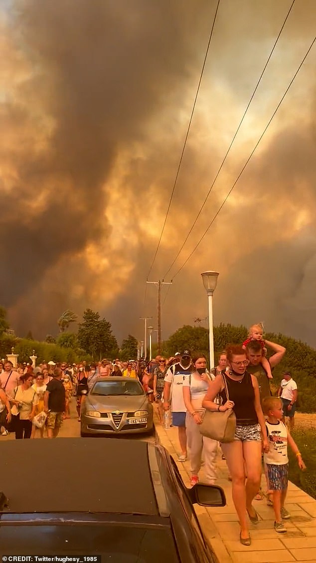 Twitter user John Hughes took a video of the chaotic scenes as the wildfire rages on the island