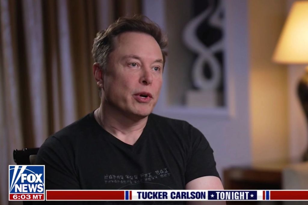 Elon Musk is seen on Tucker Carlson Tonight to discuss alien life, saying if he knew about it -- he most likely wouldn't keep it a secret.