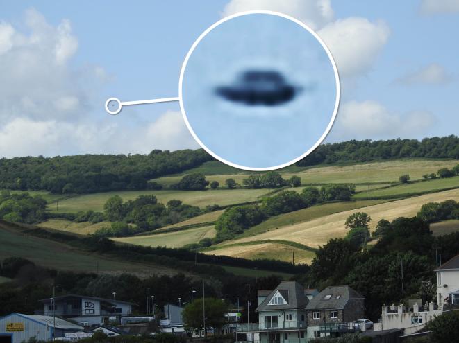 UFO sighting over sprawling countryside