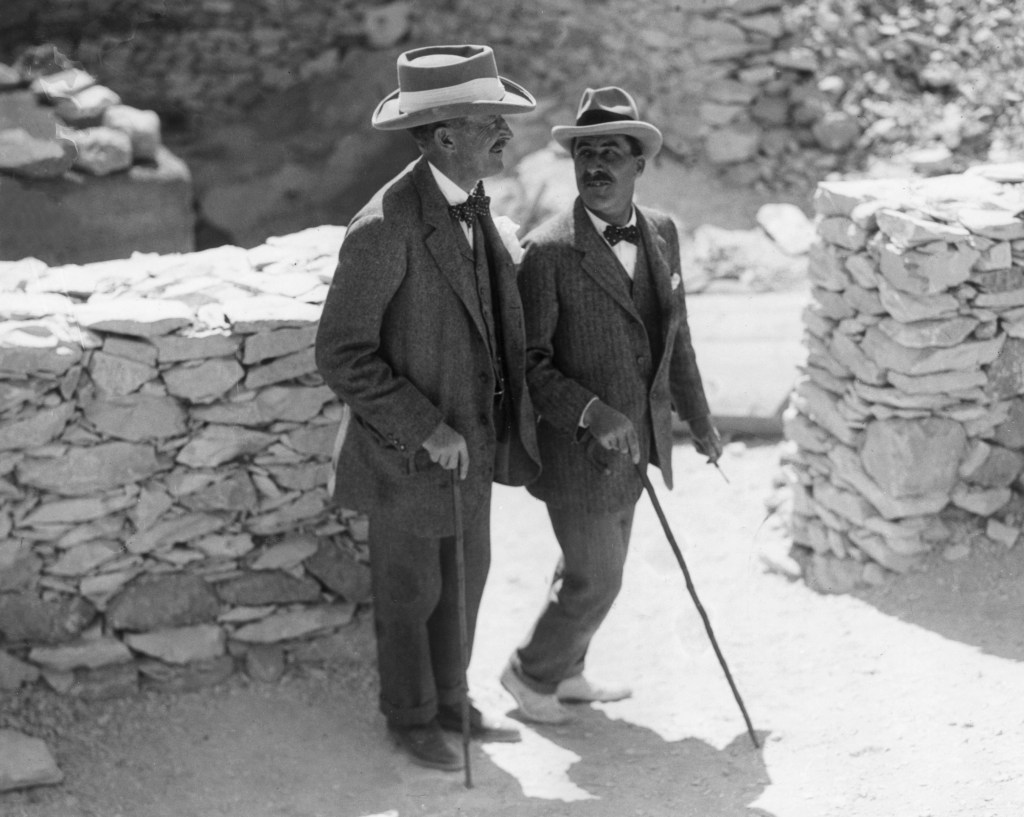 Egyptologist Howard Carter (R) walks with the patron of his research, archaeologist Lord Carnarvon at the Valley of the Kings excavation site in 1922.